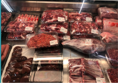 Fresh meat cuts in the display cabinet